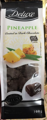 Pineapple coated in dark chocolate - Product - fr