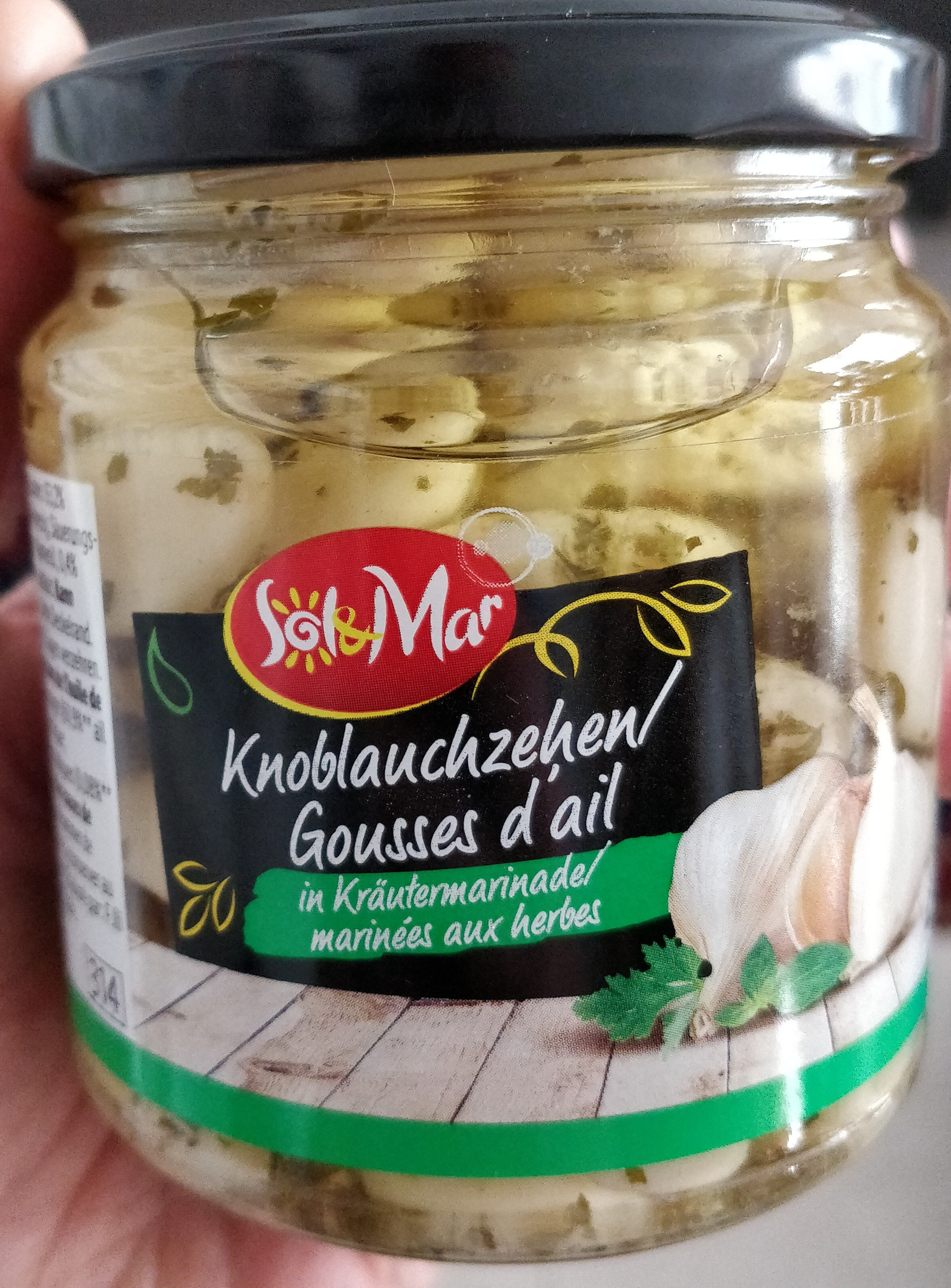 Knoblauch in Kräuteröl - Product - fr