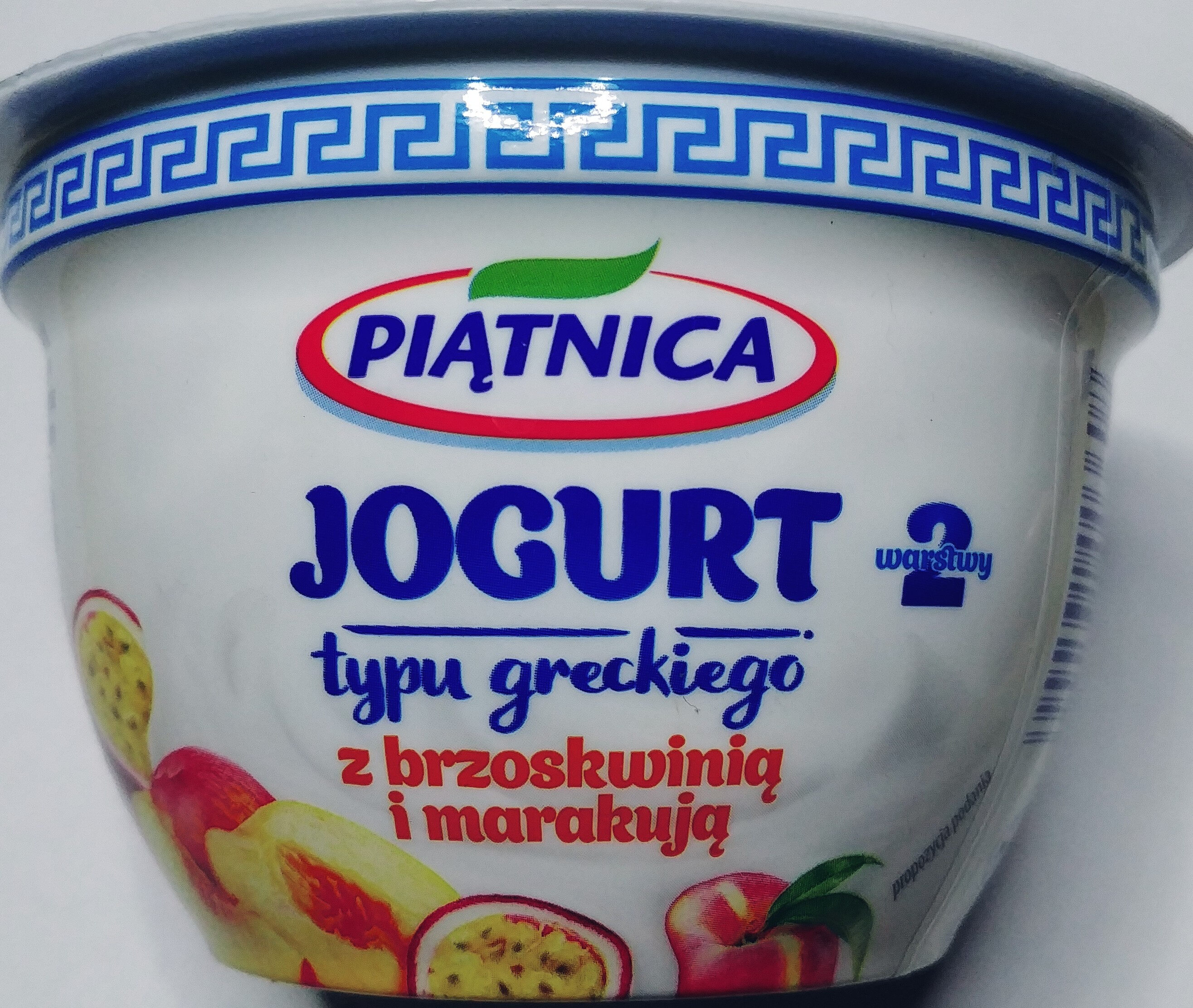 Jogurt typu greckiego z brzoskwinią i marakują 2,4% tłuszczu - Product - pl