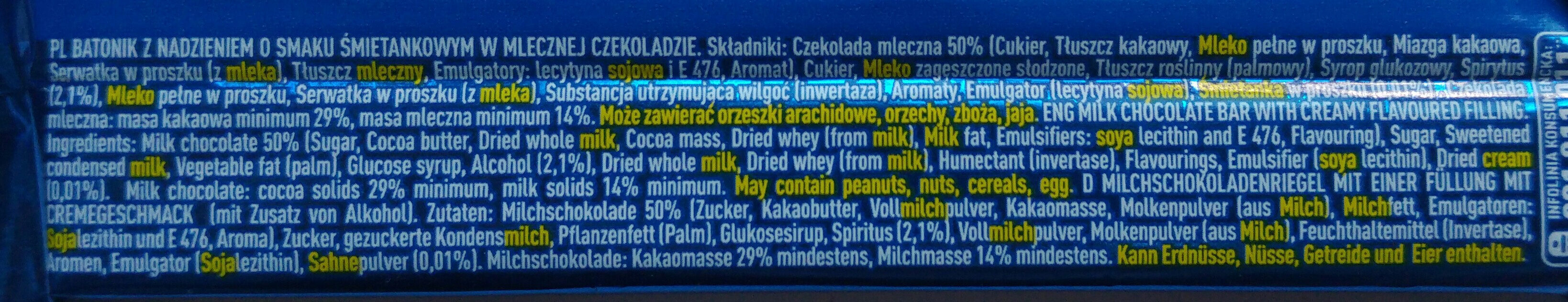 Batonik z nadzieniem o smaku śmietankowym w mlecznej czekoladzie (z dodatkiem alkoholu). - Ingredients