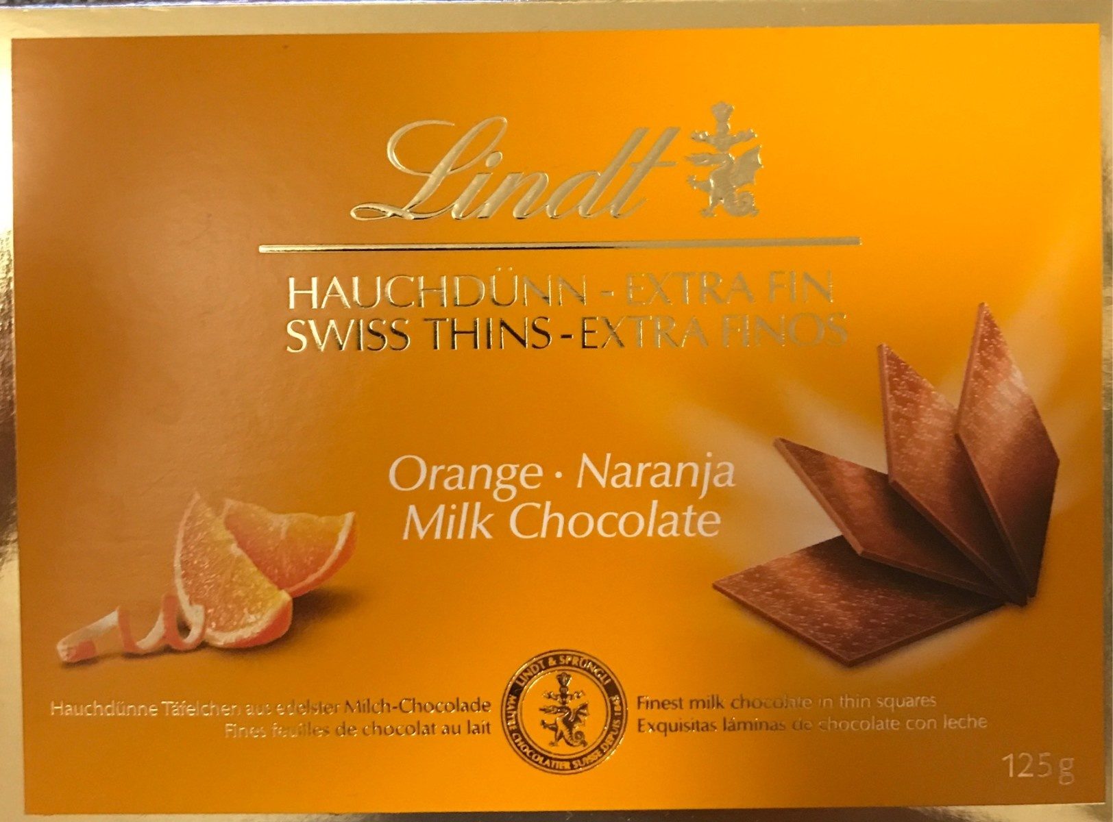 Lindt extra fin Orange chocolat au lait - Produkt - fr